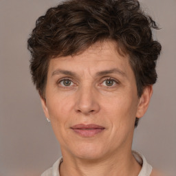 Joyful white adult female with short  brown hair and brown eyes