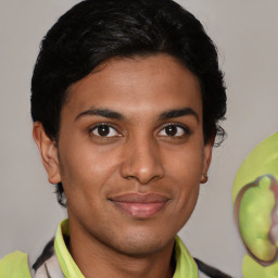 Joyful latino young-adult male with short  brown hair and brown eyes