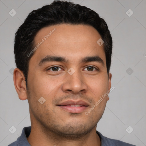 Joyful white young-adult male with short  black hair and brown eyes