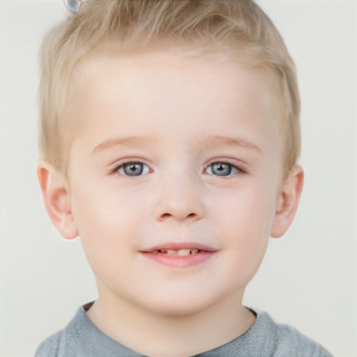 Joyful white child male with short  brown hair and grey eyes