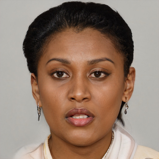 Neutral black young-adult female with short  brown hair and brown eyes