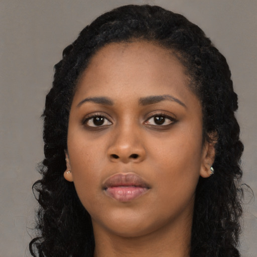 Neutral black young-adult female with long  black hair and brown eyes