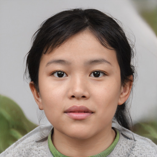 Neutral asian child female with short  brown hair and brown eyes