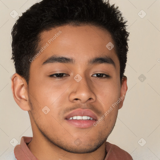 Joyful latino young-adult male with short  brown hair and brown eyes