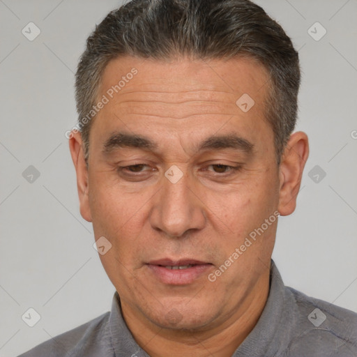 Joyful white middle-aged male with short  brown hair and brown eyes