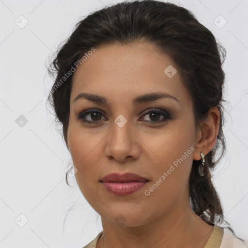 Joyful latino young-adult female with medium  brown hair and brown eyes