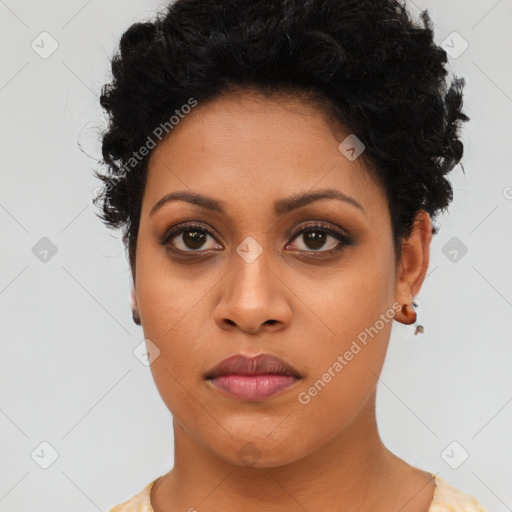 Joyful latino young-adult female with short  brown hair and brown eyes