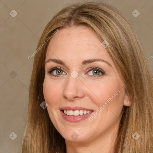 Joyful white adult female with long  brown hair and brown eyes