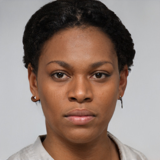 Neutral black young-adult female with short  black hair and brown eyes