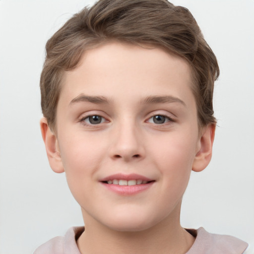 Joyful white child male with short  brown hair and brown eyes