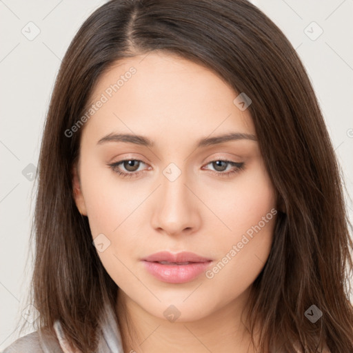 Neutral white young-adult female with long  brown hair and brown eyes