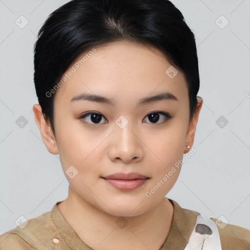 Joyful asian young-adult female with short  black hair and brown eyes