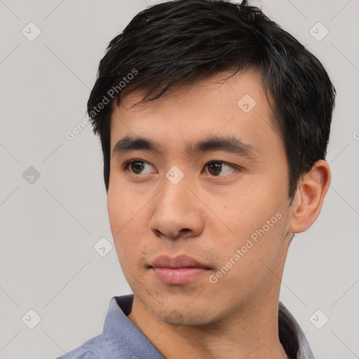 Neutral asian young-adult male with short  black hair and brown eyes