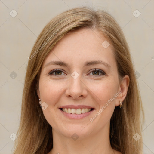 Joyful white young-adult female with long  brown hair and brown eyes