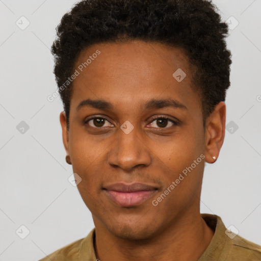 Joyful black young-adult male with short  brown hair and brown eyes