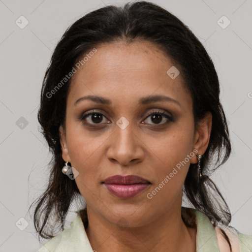 Joyful black young-adult female with medium  brown hair and brown eyes