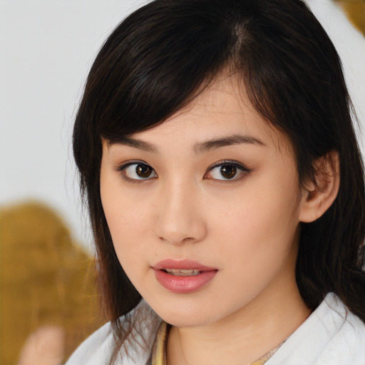 Neutral asian young-adult female with medium  brown hair and brown eyes