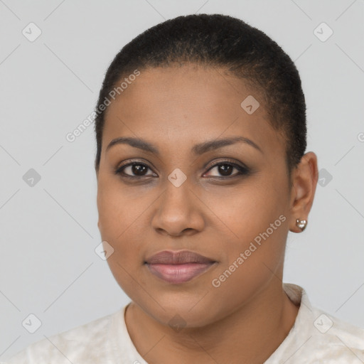 Joyful black young-adult female with short  brown hair and brown eyes