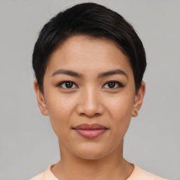 Joyful asian young-adult female with short  black hair and brown eyes