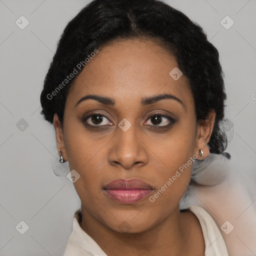 Joyful black young-adult female with medium  brown hair and brown eyes