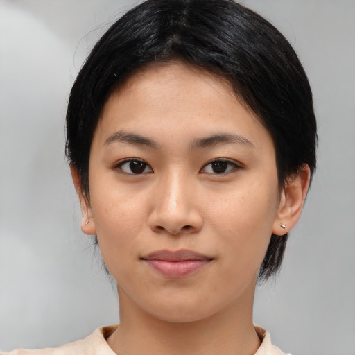 Neutral asian young-adult female with medium  black hair and brown eyes