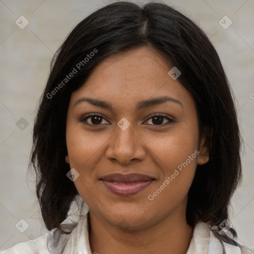 Joyful black young-adult female with medium  brown hair and brown eyes