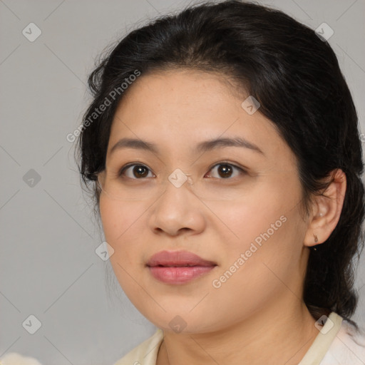 Joyful latino young-adult female with medium  brown hair and brown eyes