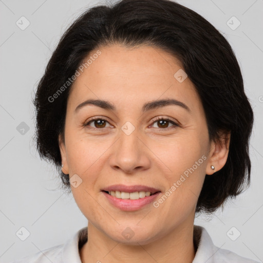 Joyful white adult female with medium  brown hair and brown eyes