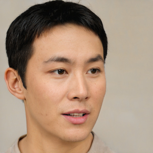 Neutral asian young-adult male with short  black hair and brown eyes