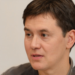 Neutral white adult male with short  brown hair and brown eyes