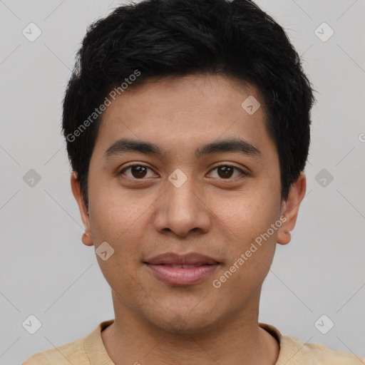 Joyful asian young-adult male with short  black hair and brown eyes