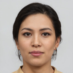 Neutral asian young-adult female with medium  brown hair and brown eyes