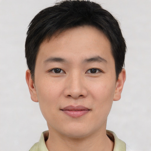 Neutral asian young-adult male with short  brown hair and brown eyes