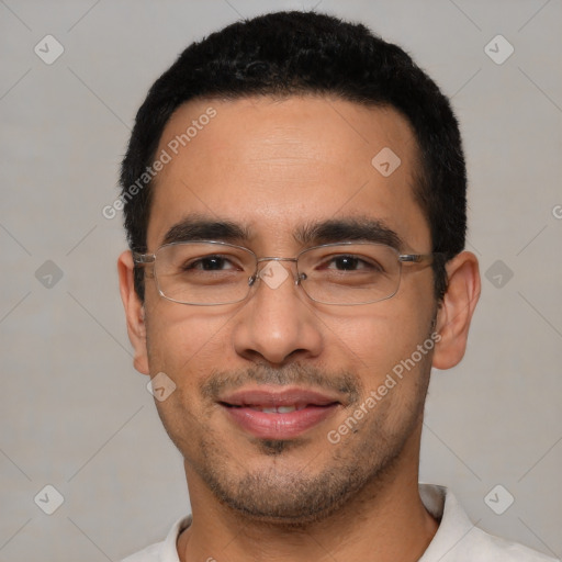 Joyful white young-adult male with short  black hair and brown eyes