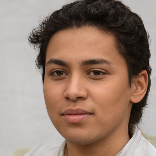 Joyful white young-adult female with short  brown hair and brown eyes