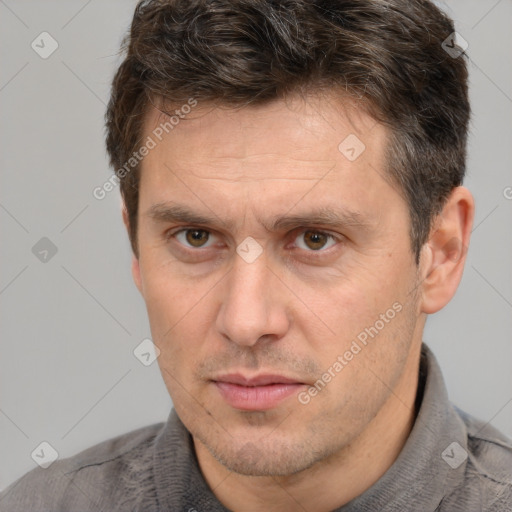 Neutral white adult male with short  brown hair and brown eyes