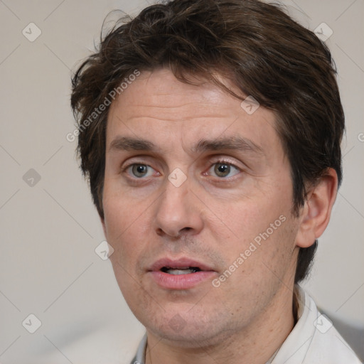 Neutral white adult male with short  brown hair and brown eyes