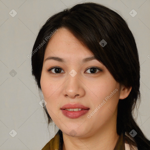 Joyful asian young-adult female with medium  black hair and brown eyes