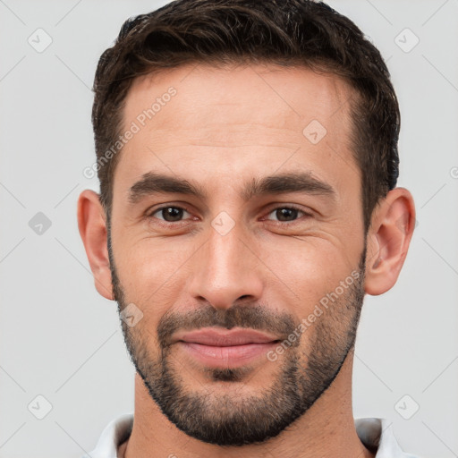 Joyful white young-adult male with short  brown hair and brown eyes