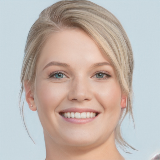 Joyful white young-adult female with medium  blond hair and blue eyes