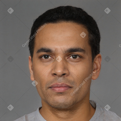 Neutral latino young-adult male with short  black hair and brown eyes