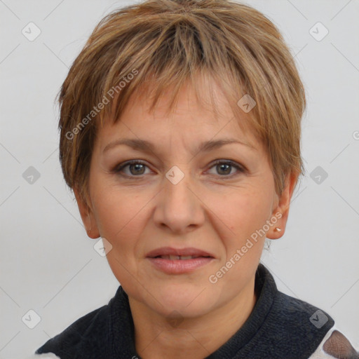 Joyful white adult female with short  brown hair and brown eyes