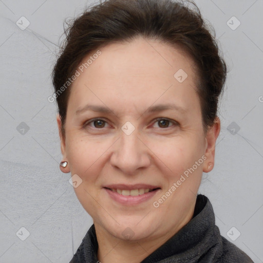 Joyful white adult female with short  brown hair and brown eyes