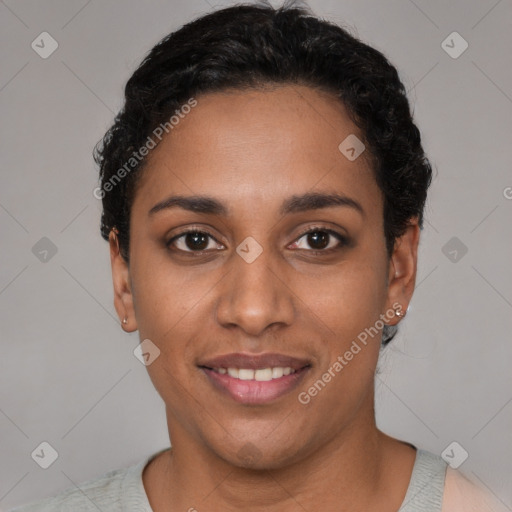 Joyful latino young-adult female with short  black hair and brown eyes