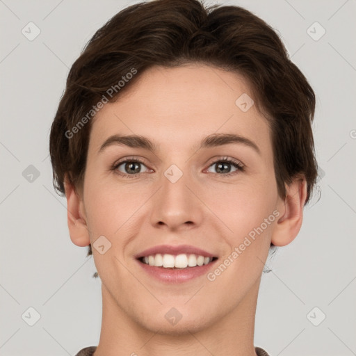 Joyful white young-adult female with short  brown hair and grey eyes