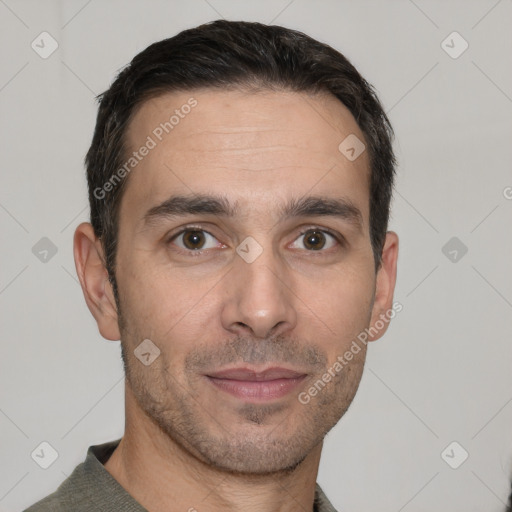 Joyful white adult male with short  brown hair and brown eyes