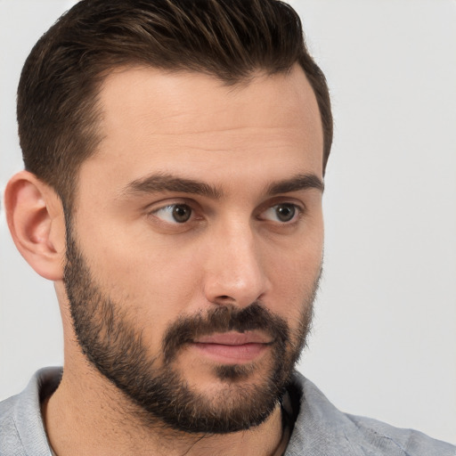 Neutral white young-adult male with short  brown hair and brown eyes