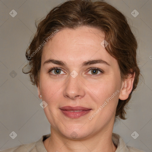 Joyful white adult female with medium  brown hair and grey eyes