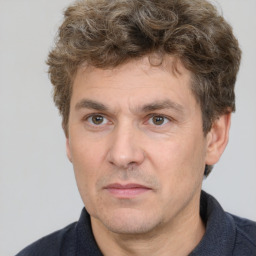 Neutral white adult male with short  brown hair and brown eyes