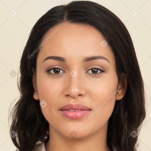 Joyful latino young-adult female with long  brown hair and brown eyes